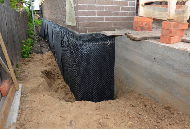 SJ Waterproofing Pros technician performing targeted Waterproofing assessment in Marysville, MI